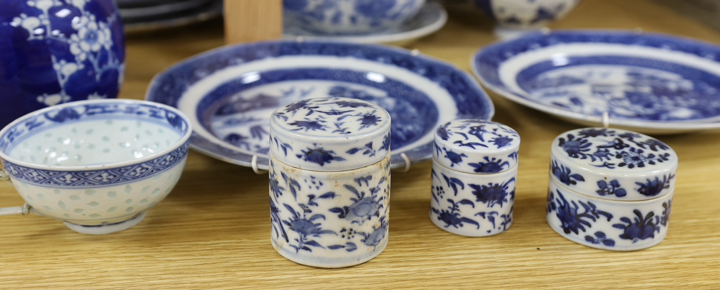 A collection of Chinese and Japanese blue and white jars, export plates and pots, together with European blue and white mixed tea wares